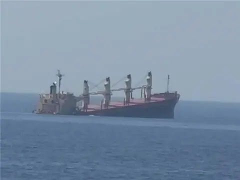 Fertilizer-carrying cargo ship partially sinks in Red Sea following attack – NYT